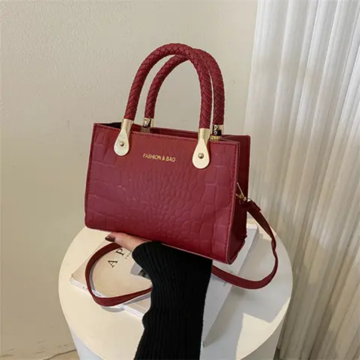 Sac à main vert croco tendance avec poignées tressées et chaîne réglable