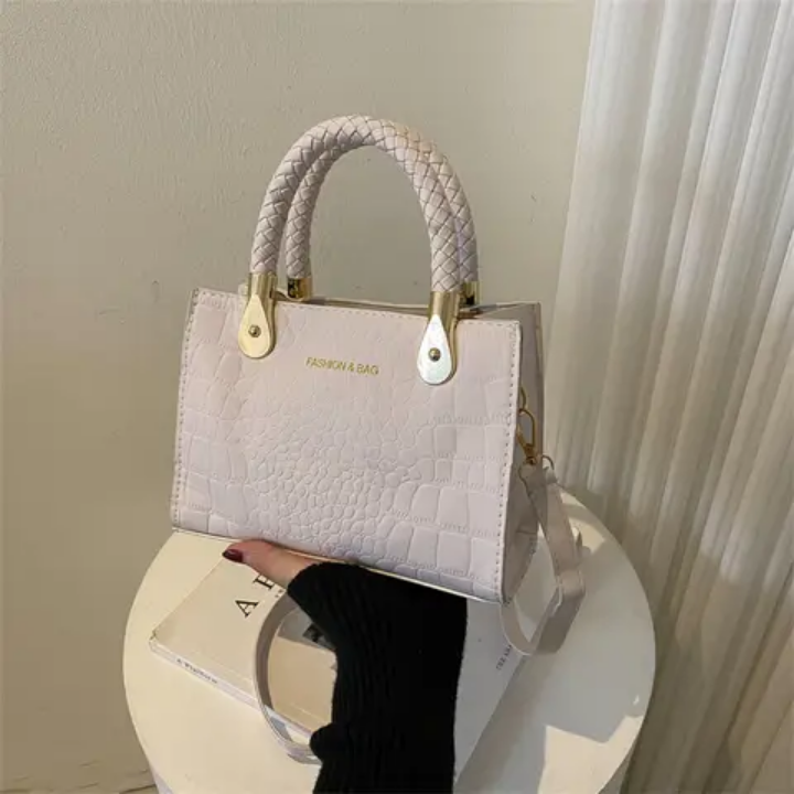 Sac à main vert croco tendance avec poignées tressées et chaîne réglable