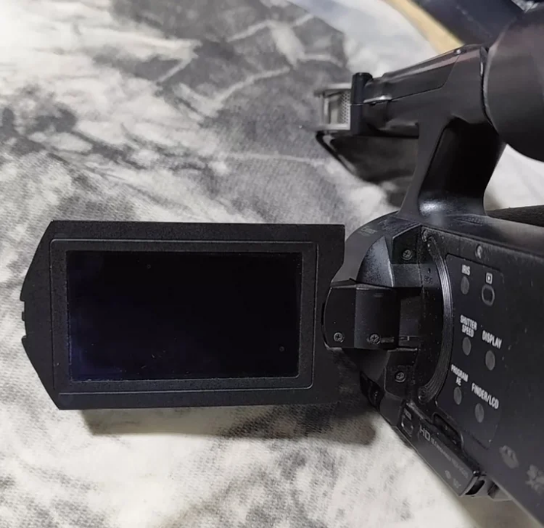Sony NEX-VG10E – Caméscope Numérique Full HD à Objectifs Interchangeables (Monture E, Capteur APS-C 14.2 MP, Zoom Optique 11x)